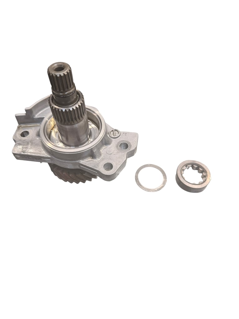 Automotive differential carrier assembly with gears, shafts, and separate washers and bearing ring components