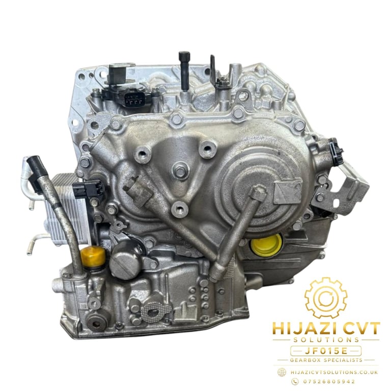 Metallic automotive CVT transmission engine block with yellow components and Rijazi CVT gearbox specialist logo