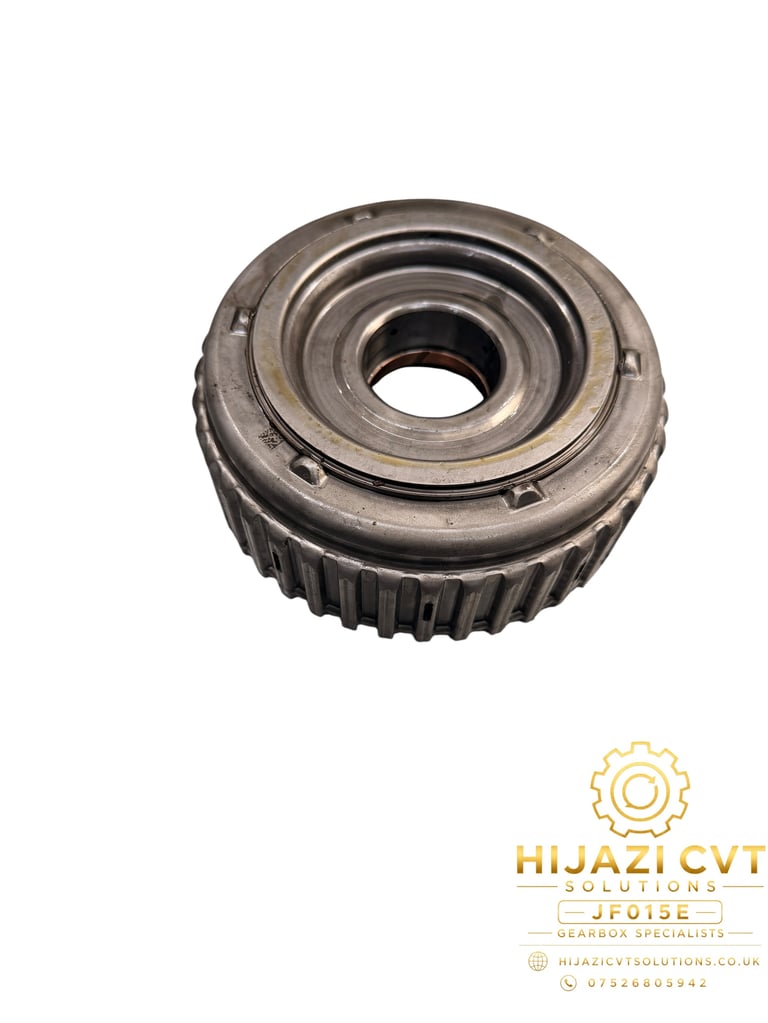 Close-up of a metal CVT transmission pulley with grooved teeth and central hole on white background