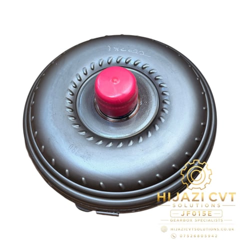 Torque converter with red center button and serrated gray outer ring, branded Hijazi CVT Solutions