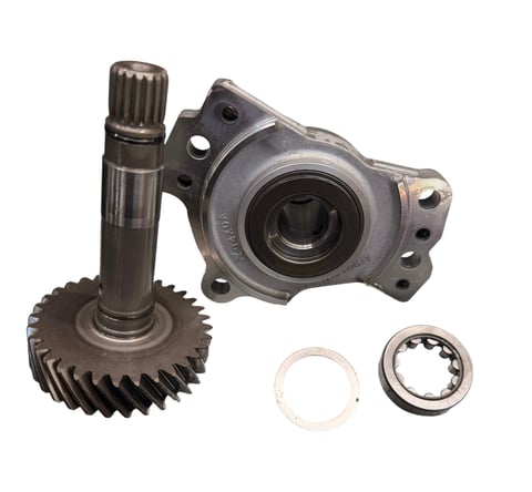 Automotive differential gear assembly with pinion gear, carrier housing, gasket, and bearing ring components